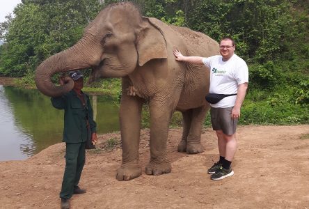 Local autistic man takes solo trip of a lifetime to Laos