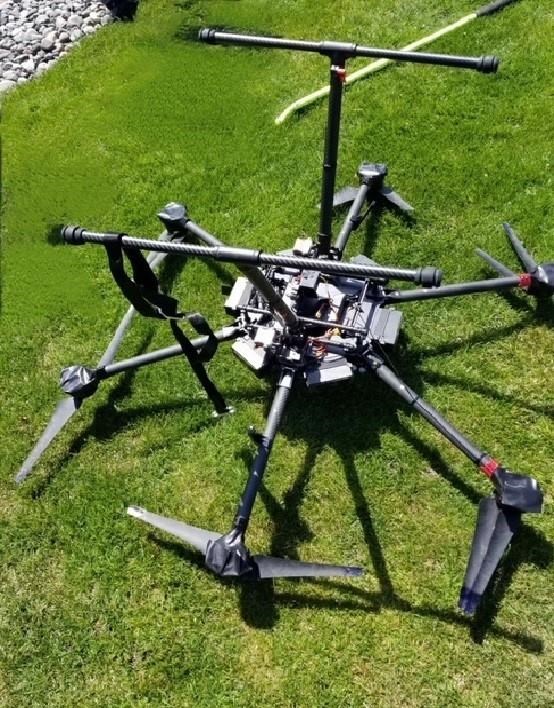 Large drone carrying firearms found in tree in southwestern Ontario