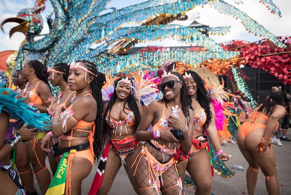 Tourists flock to Toronto to celebrate return of Caribbean Carnival parade