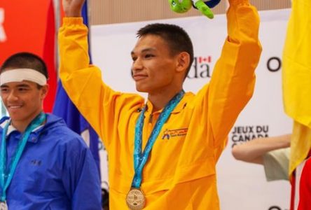 Wrestler Eekeeluak Avalak dedicates historic Canada Games gold to his late brother