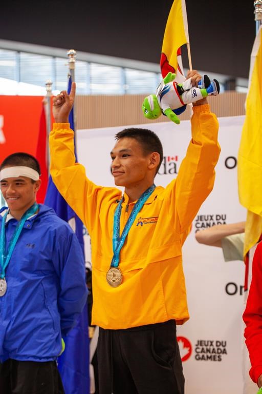 Wrestler Eekeeluak Avalak dedicates historic Canada Games gold to his late brother