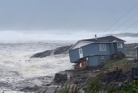 Fiona sweeps away houses, knocks out power in eastern Canada