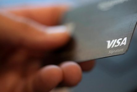 Credit card debt at record high amid stubbornly hot inflation, survey says