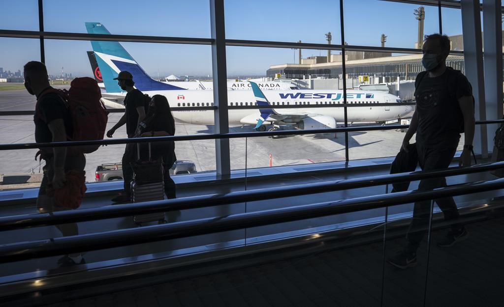 WestJet says it’s back online after global outage, but more disruptions expected