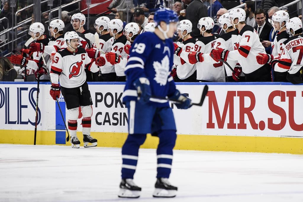 Devils down Maple Leafs 3-2 in overtime for 11th straight win