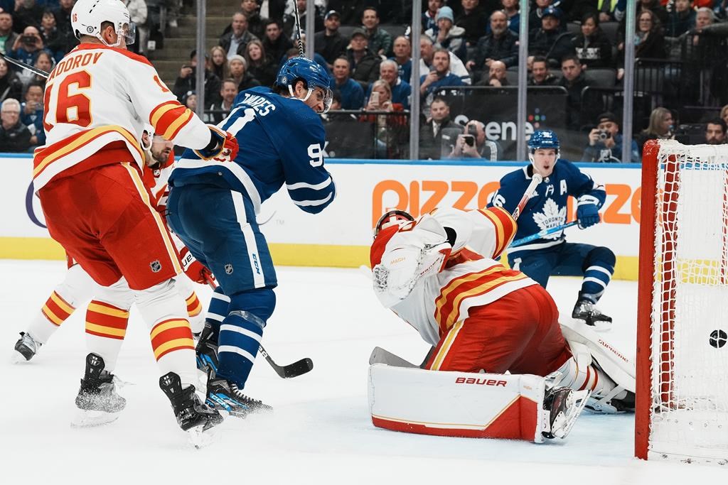 Marner nets OT winner, extends point streak to 22 games as Maple Leafs top Flames 5-4