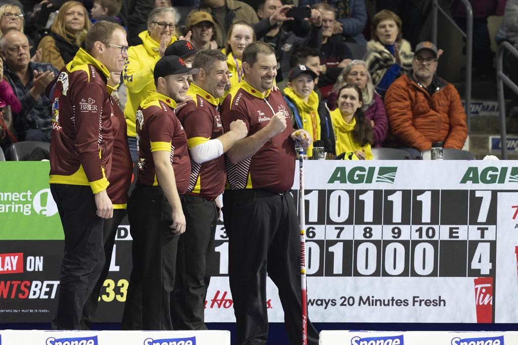 Nunavut’s Jake Higgs guides his team to territory’s first-ever win at Brier