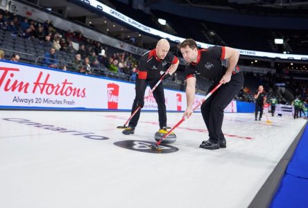 Playing with Hart: Lead Joe Hart and father Richard wearing Ontario colours at Brier