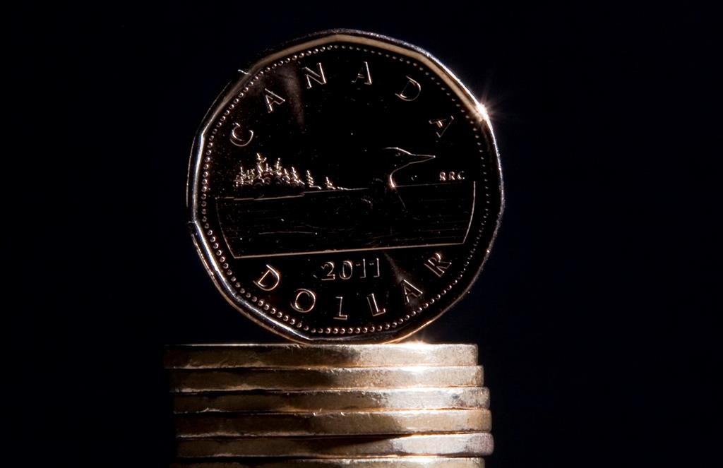 Loonie hits four-month low as Bank of Canada holds key interest rate