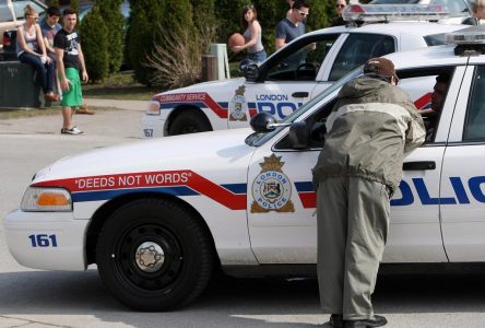 London man faces murder charge after standoff, accused of injuring two cops