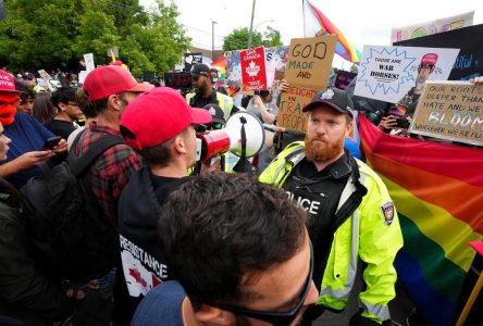 Duelling protests over LGBTQ rights outside Ottawa schools draw hundreds