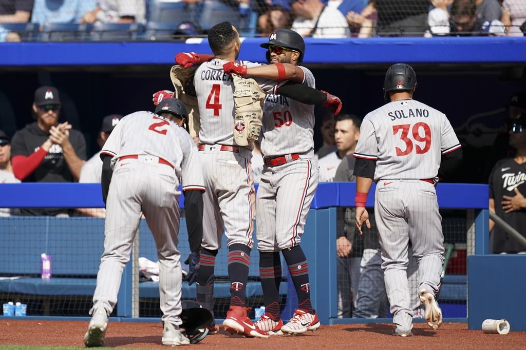 Correa’s grand slam leads Twins past Blue Jays in 9-4 comeback victory