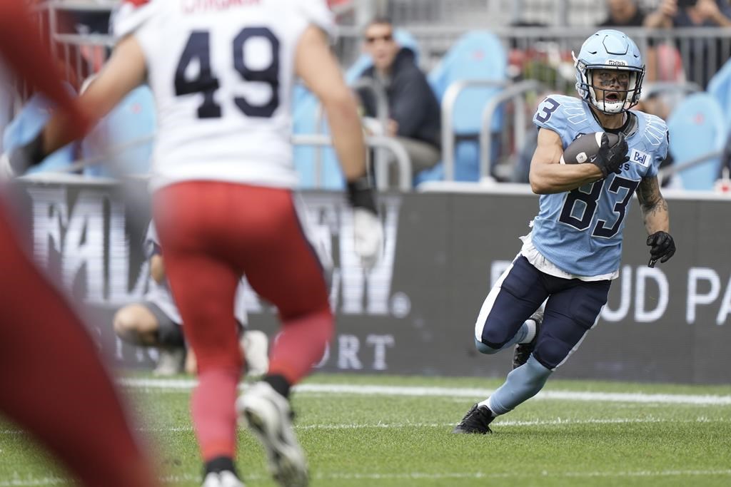 Ouellette rushes for two TDs, Argos cement playoff berth with win over Alouettes