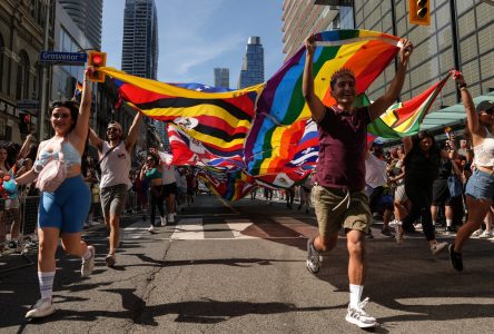 Downtown Toronto streets fill with revelers, rainbow flags for city’s Pride parade