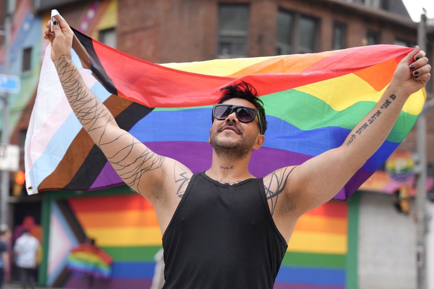 ‘It just makes me feel home’: LGBTQ+ newcomers celebrate first Pride in Canada
