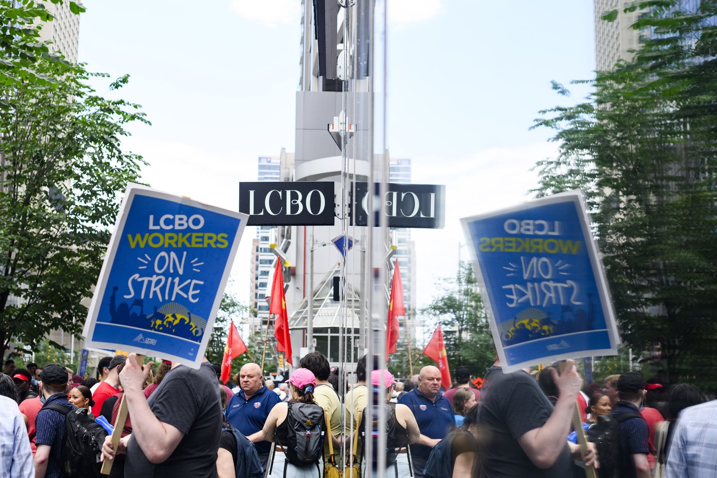 Dozens of LCBO workers rally in downtown Toronto on day 2 of historic strike