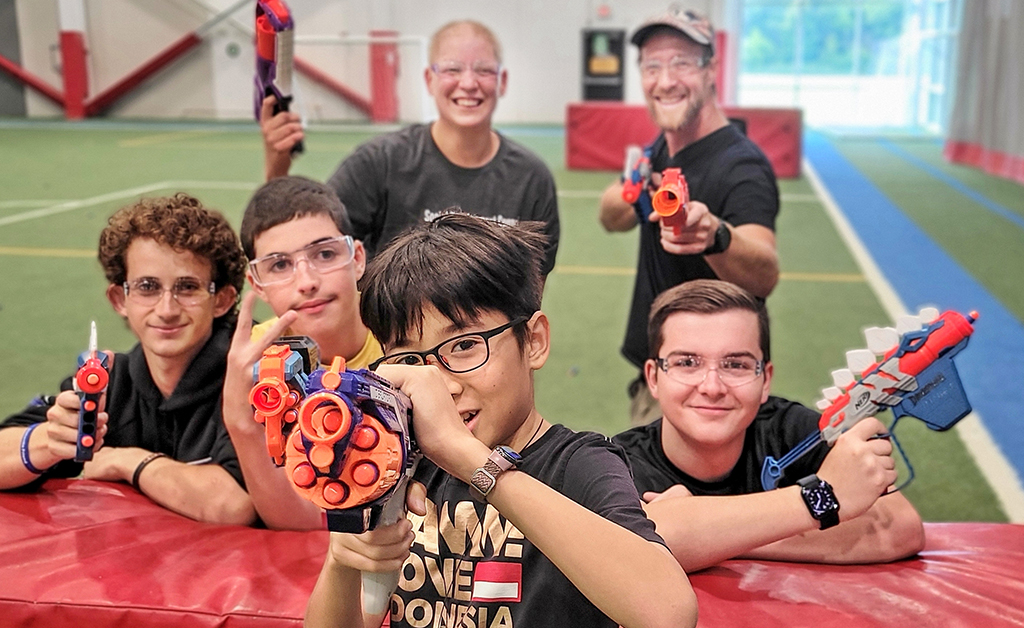 Teens enjoy epic summer Nerf battles