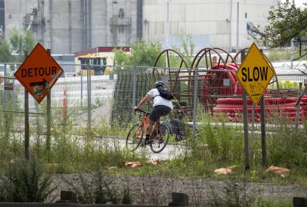 Toronto lays bylaw charges against companies that blocked road after cyclist death