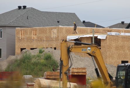 CMHC says annual pace of housing starts in Canada slowed in August