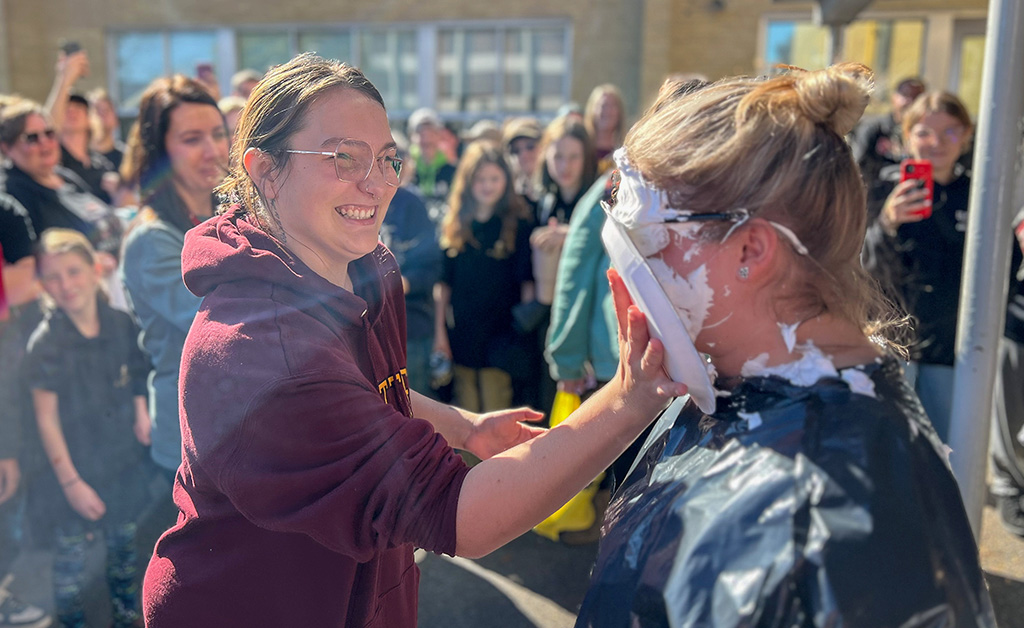 Students Pie Teachers at Fall Frenzy