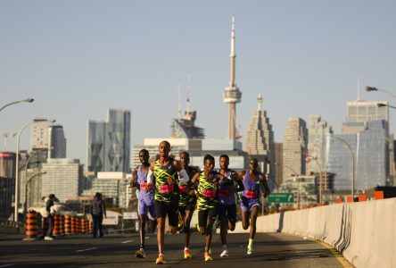 Justin Kent and Natasha Wodak top Canadians at TCS Toronto Waterfront Marathon