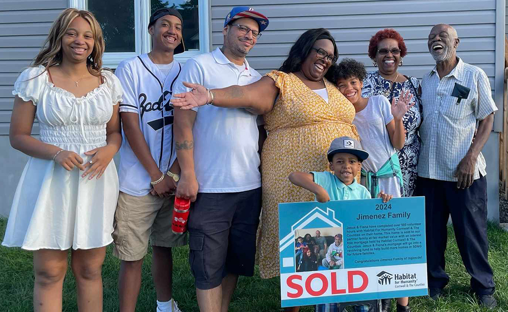 Home sweet home: Family celebrates purchase of Habit for Humanity house